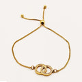 Bracelet Double Cercles Croisés Cristaux Luxe