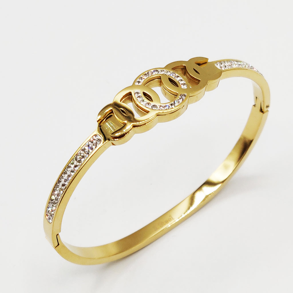 Bracelet Rigide Cercles Emmêlés Cristaux