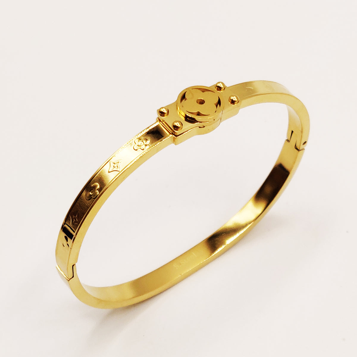 Bracelet Rigide Plaque Trèfles et Étoiles Luxe