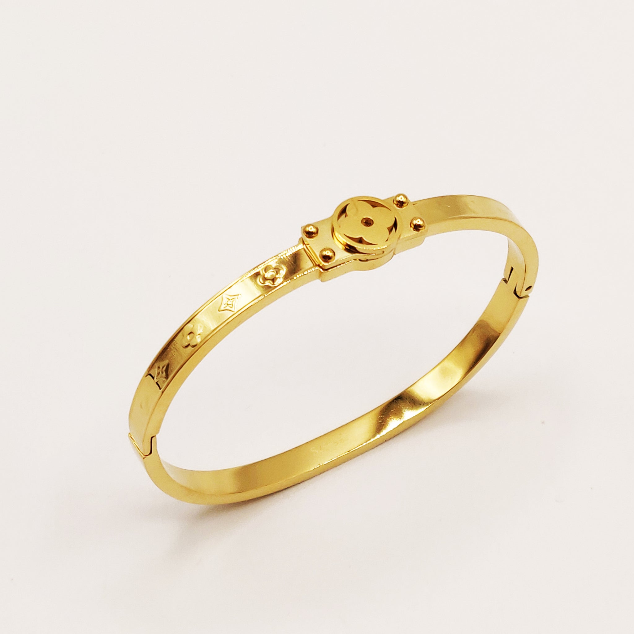 Bracelet Rigide Plaque Trèfles et Étoiles Luxe