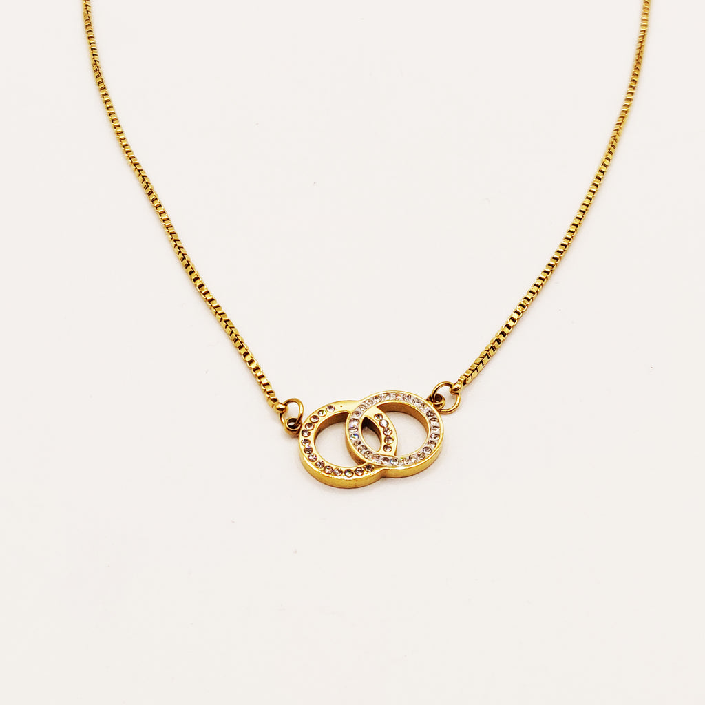 Collier Double Cercles Croisés Cristaux Luxe