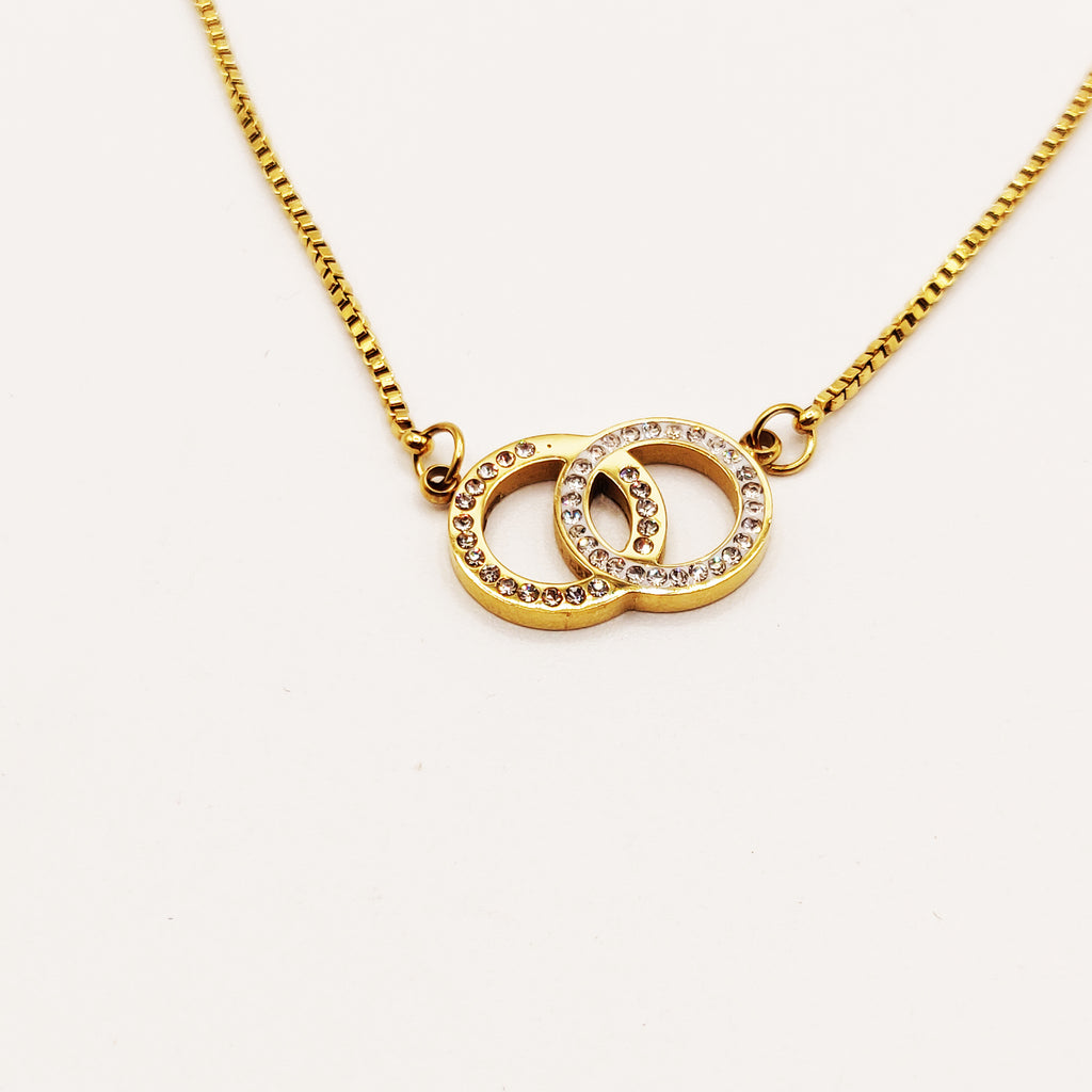 Collier Double Cercles Croisés Cristaux Luxe