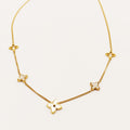 Collier Étoiles Trèfles Blancs Nacrés Luxe