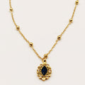 Collier Multi Perles Dorées et Cristal Bleu Ovale Luxe