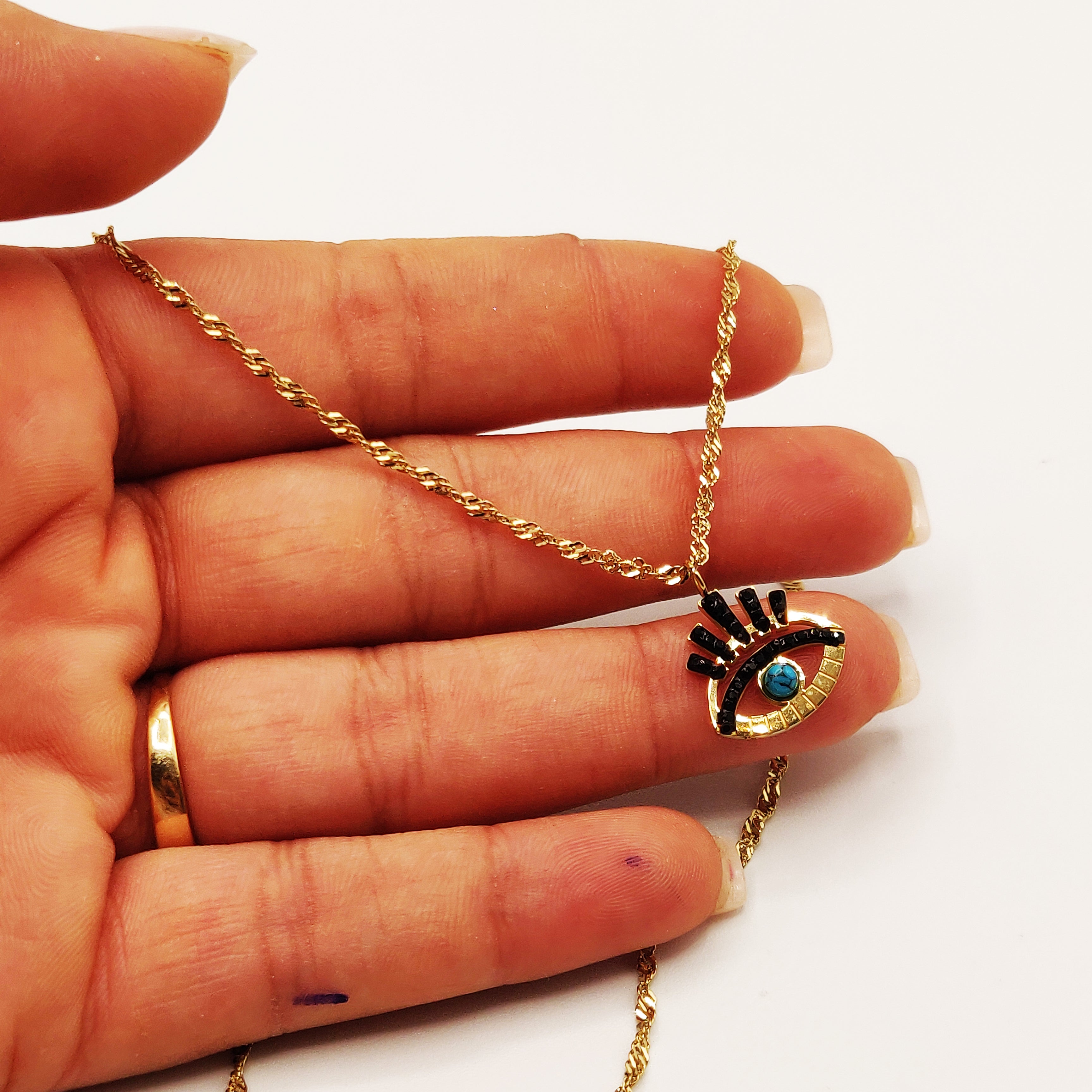 Collier Oeil Cristaux Noirs et Perle Bleue