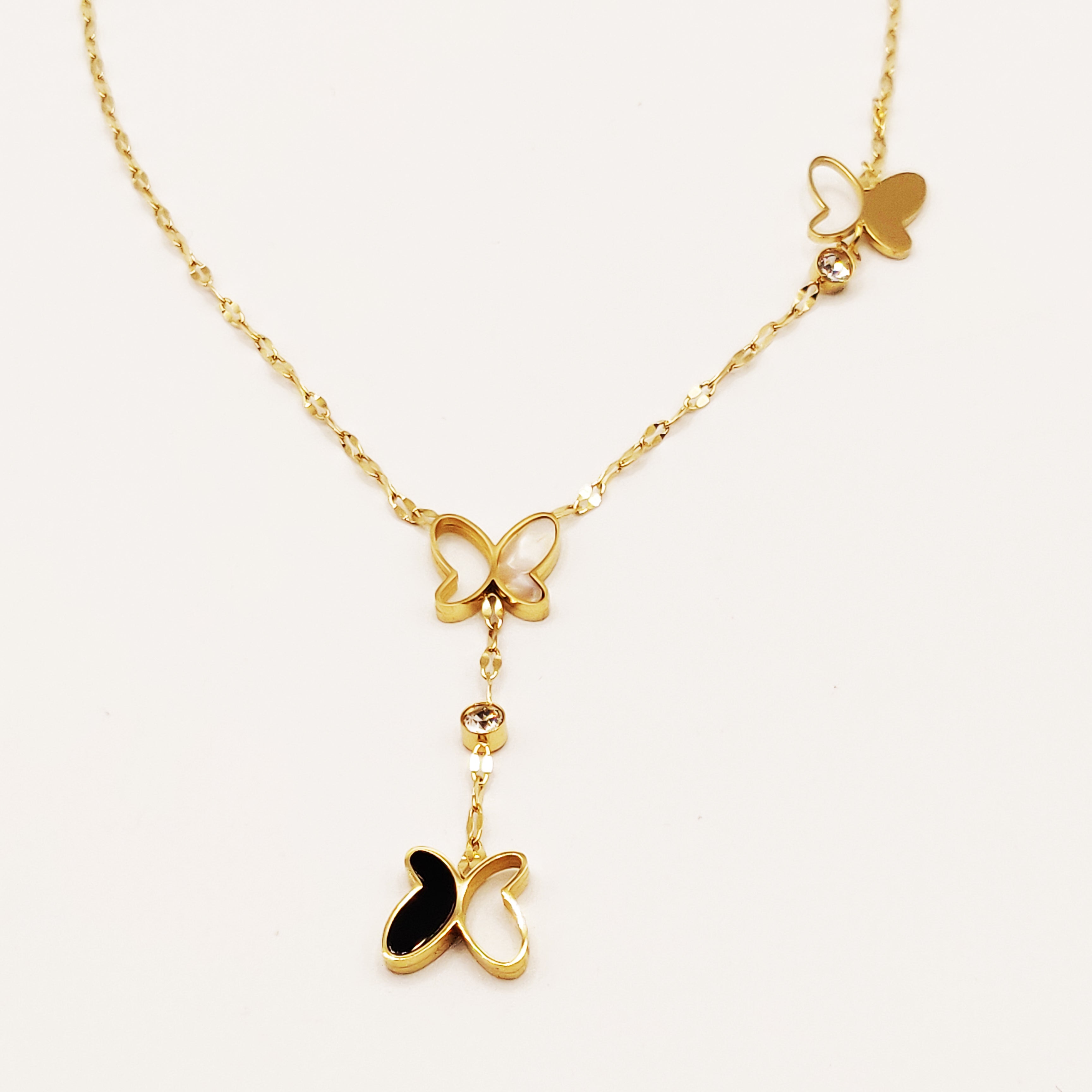 Collier Papillons Noir, Blanc Nacré et Doré
