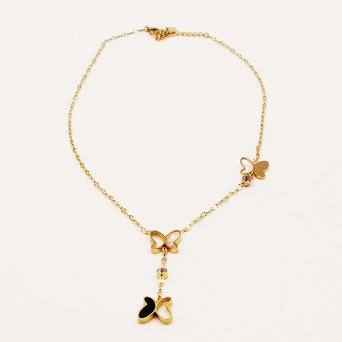 Collier Papillons Noir, Blanc Nacré et Doré