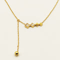 Collier Trèfles Blancs Nacrés et Perle Dorée