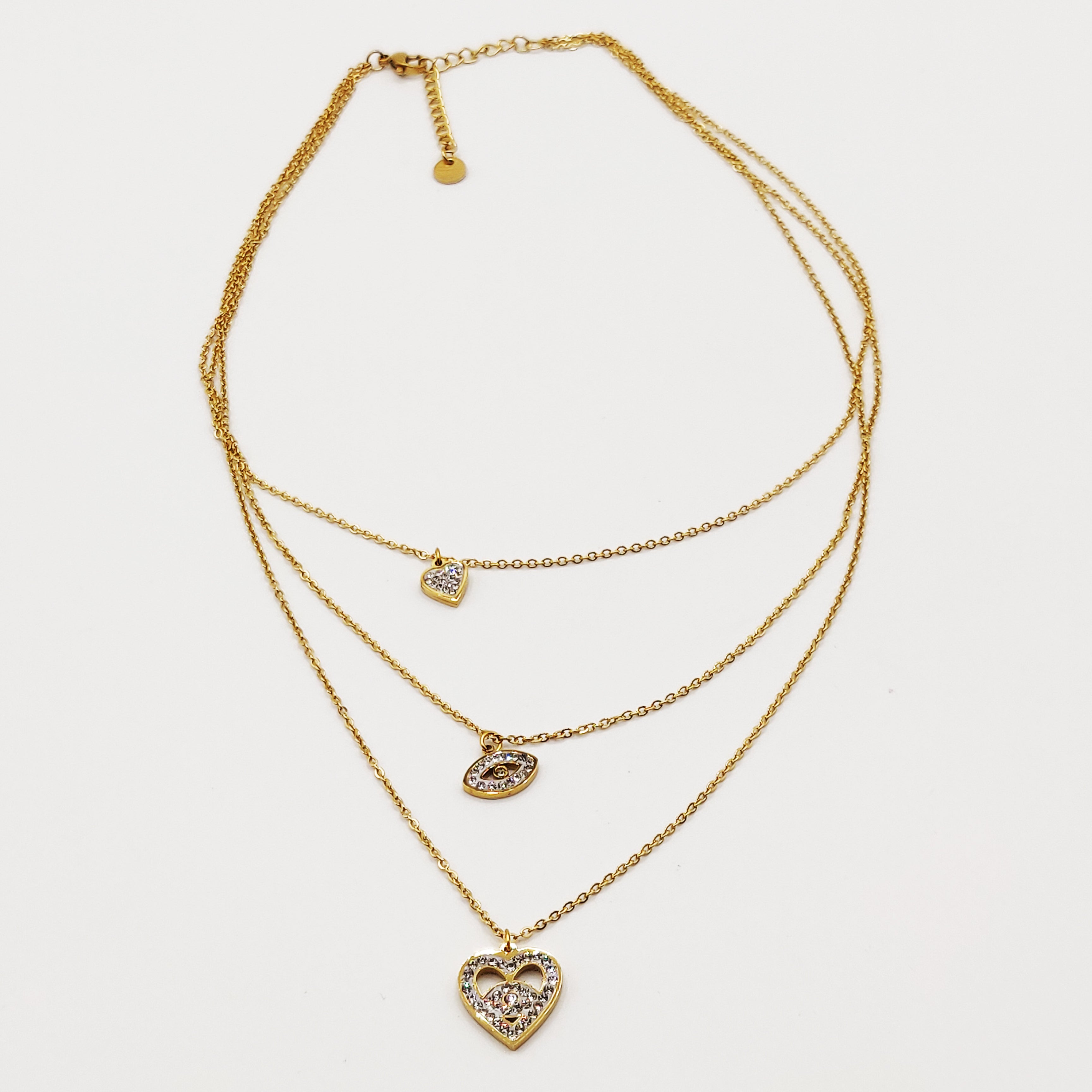 Collier Triple Coeur et Oeil Cristaux