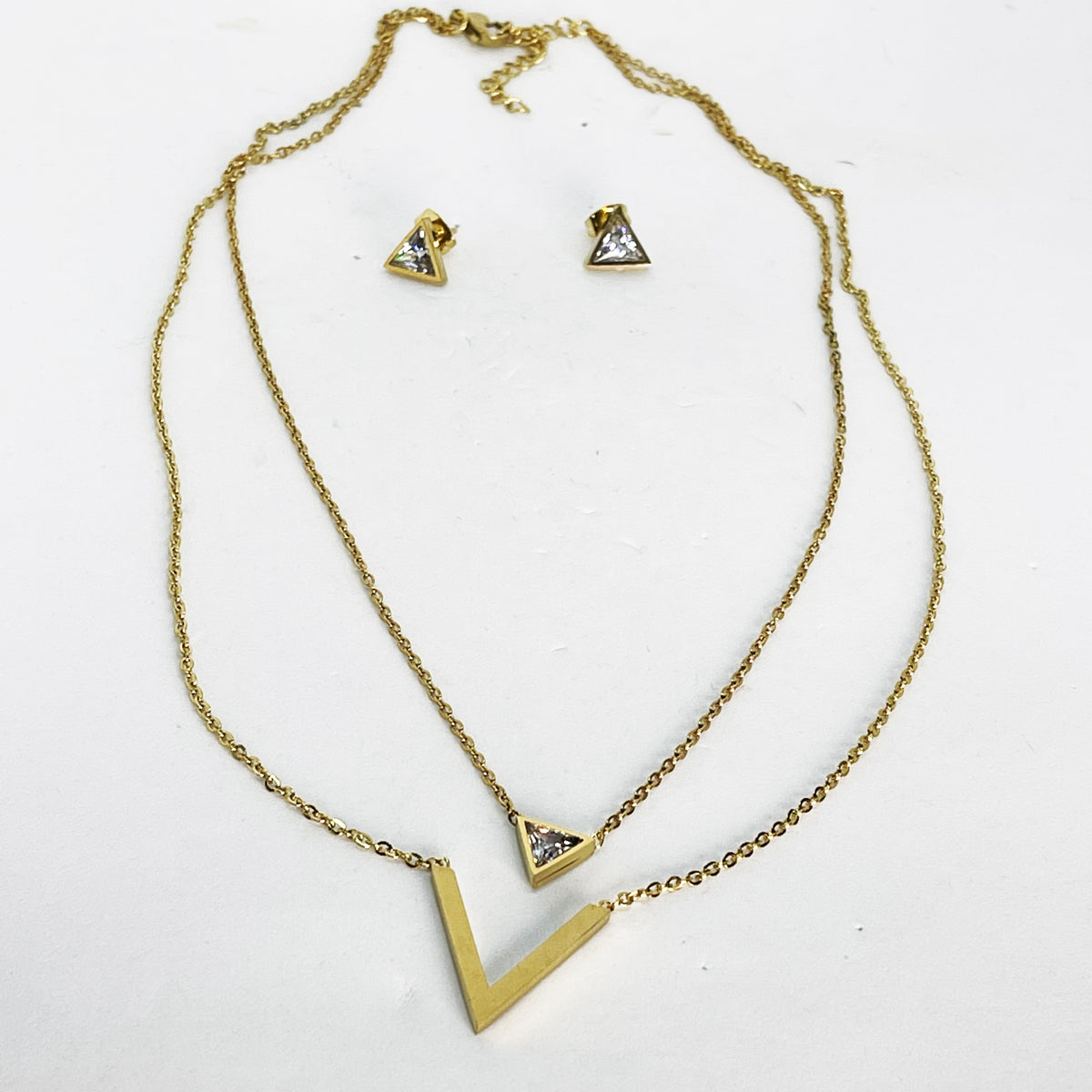 Ensemble Collier et Boucles d'oreilles Double V Cristaux