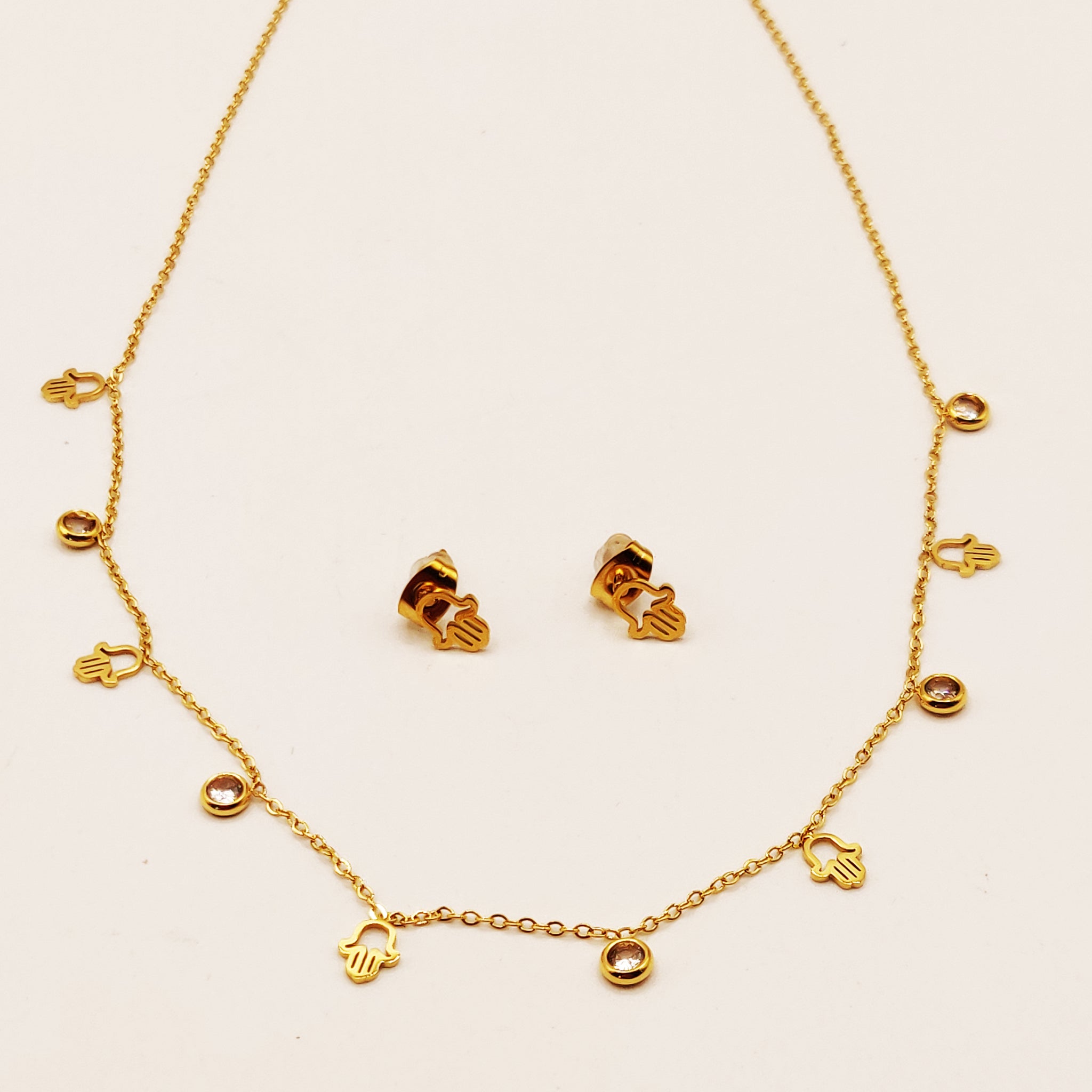 Ensemble Collier et Boucles d'oreilles Mains de Fatma Creuses et Cristaux