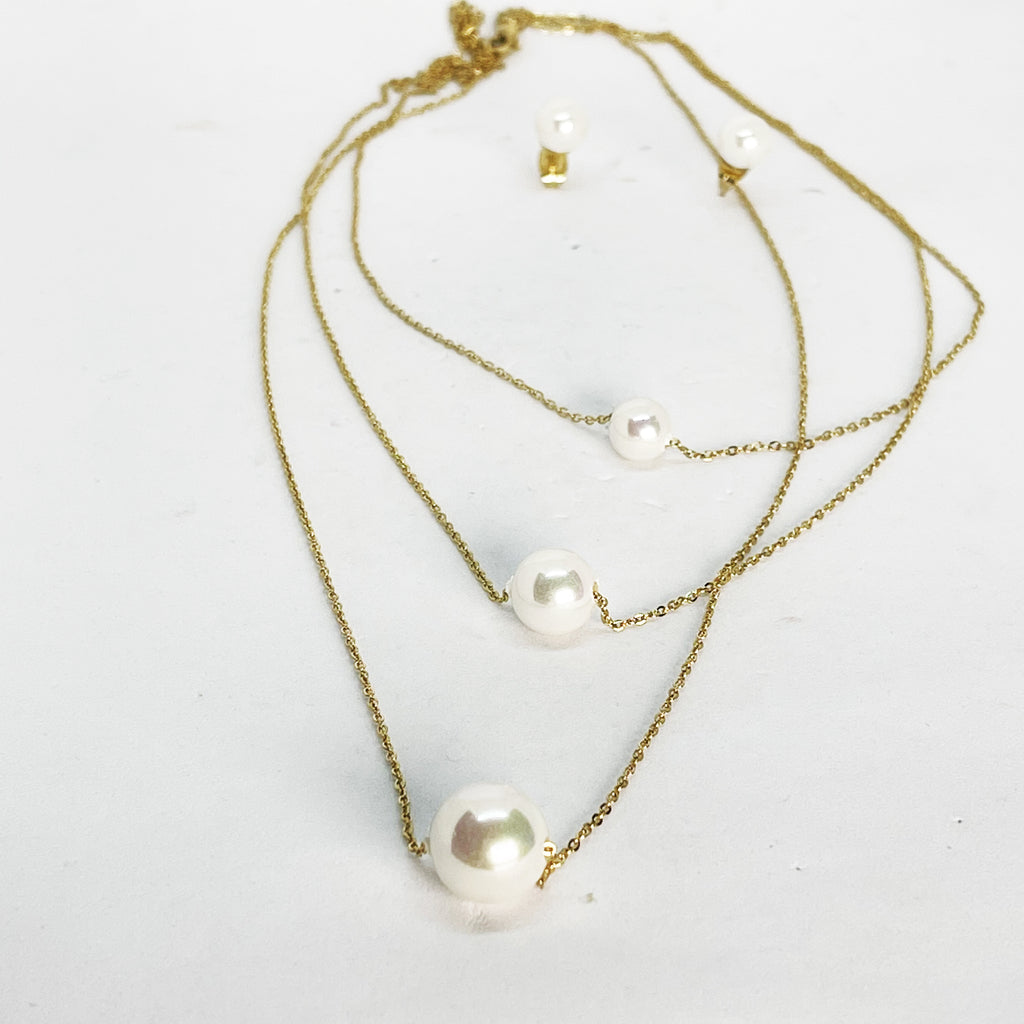 Ensemble Collier et Boucles d'oreilles Triple Perles Blanches