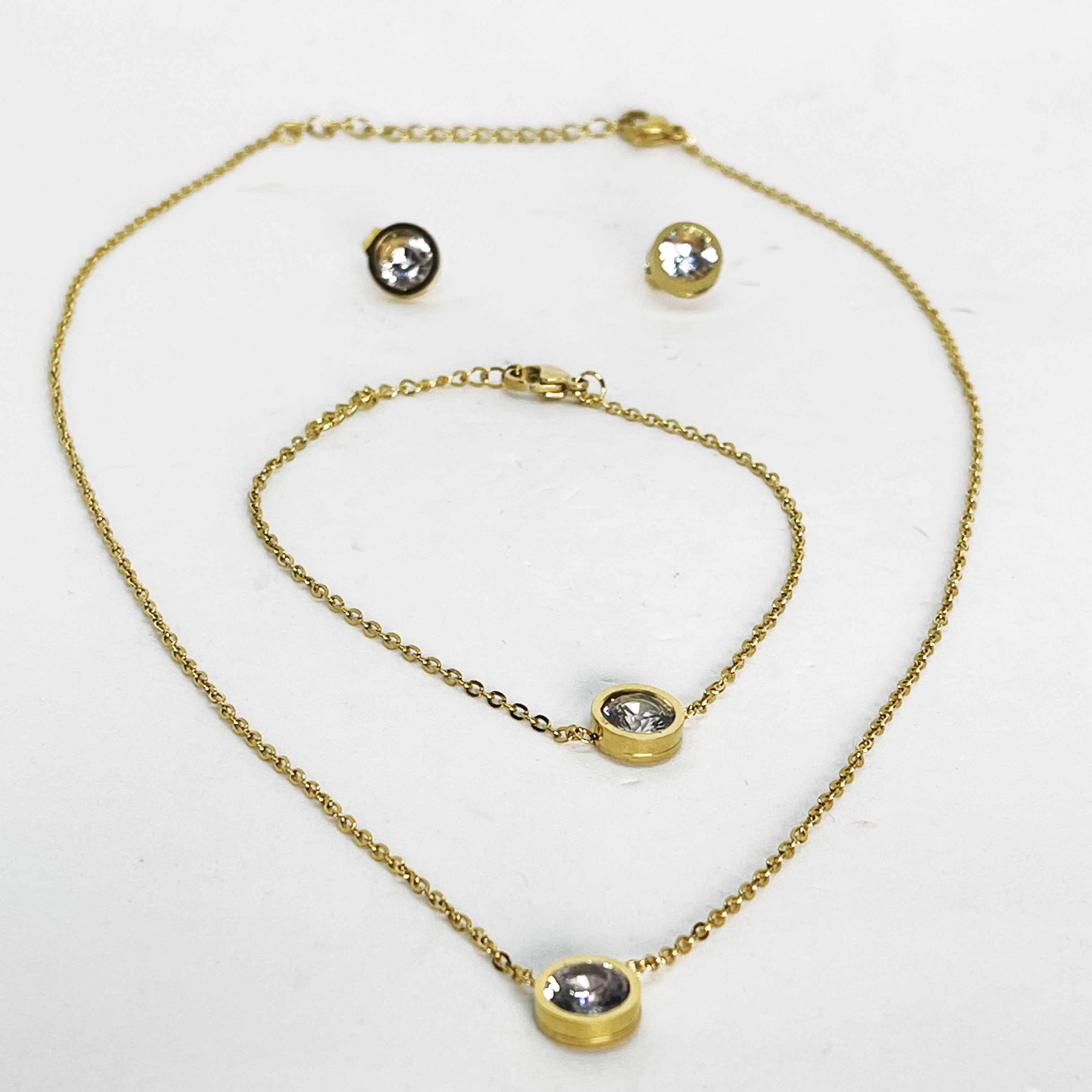 Ensemble Collier, Bracelet et Boucles d'oreilles Cristaux