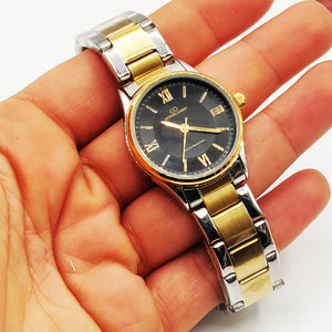 Montre EU4558 Fond Noir Bracelet Argenté et Doré